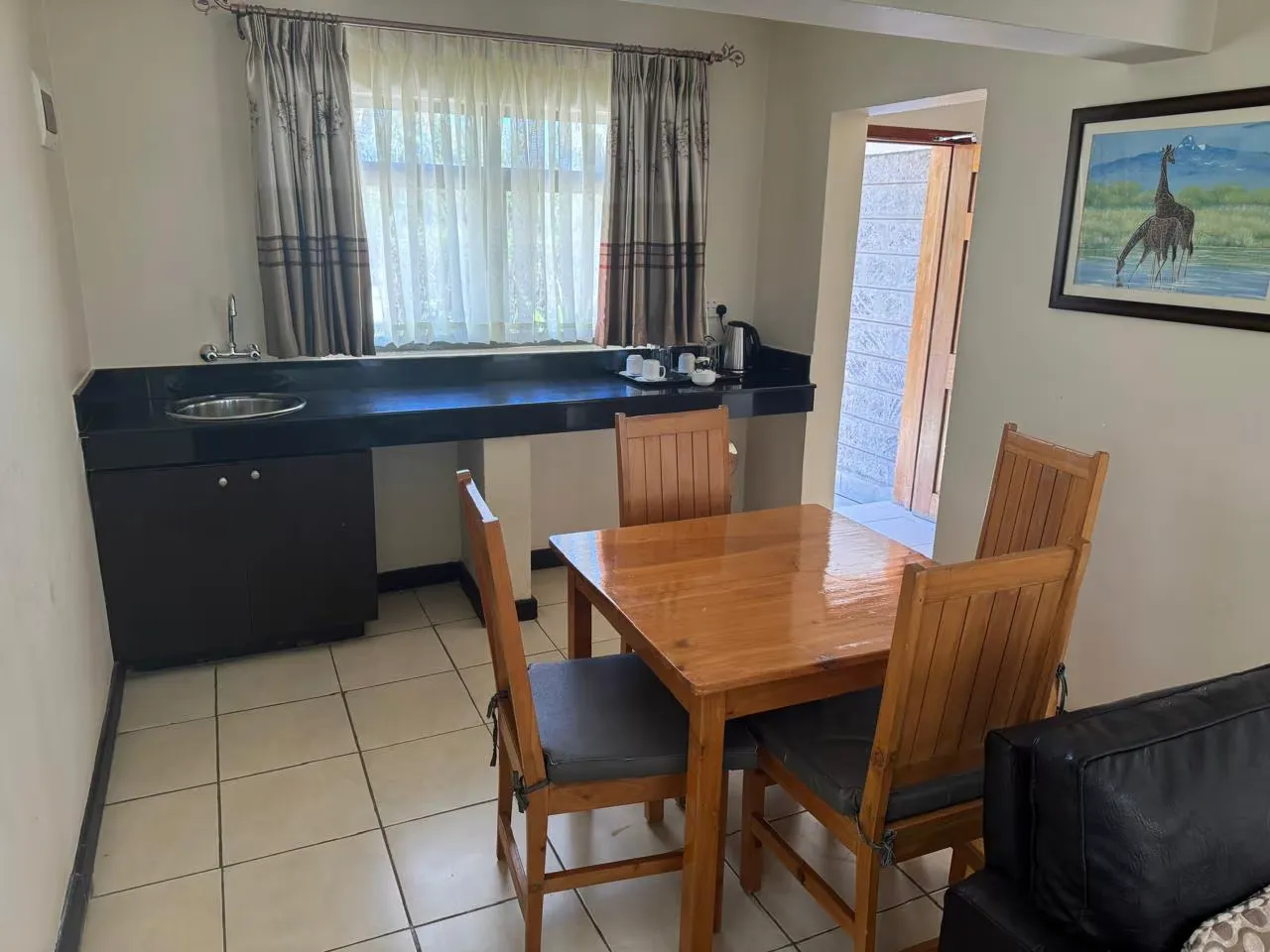 Kitchenette and dining area inside a residential unit