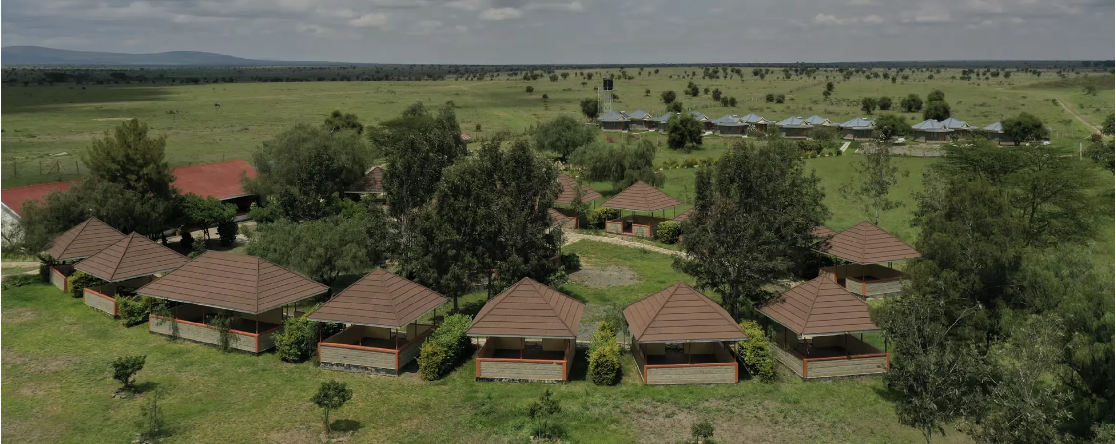 Aerial view of the ARES academy set across open savanna near Nairobi