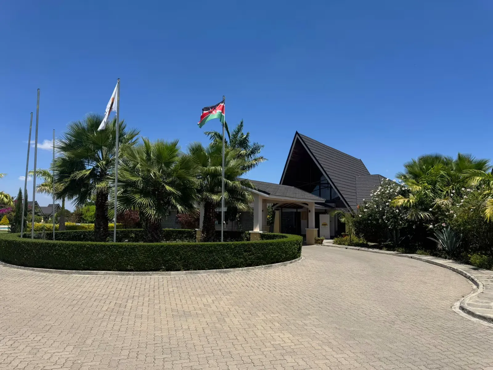 The academy's main entrance, flying the Kenyan and ARES flags
